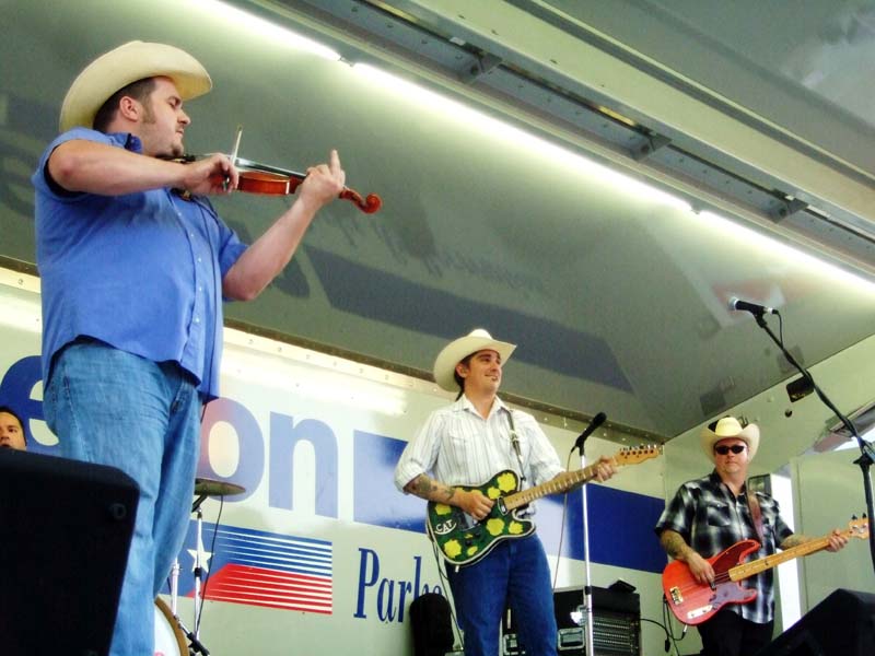 Photo of band members performing